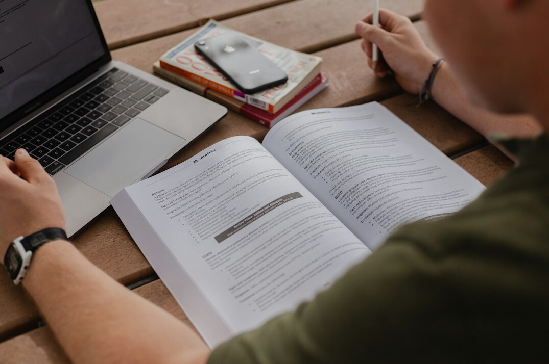 person studying finance books