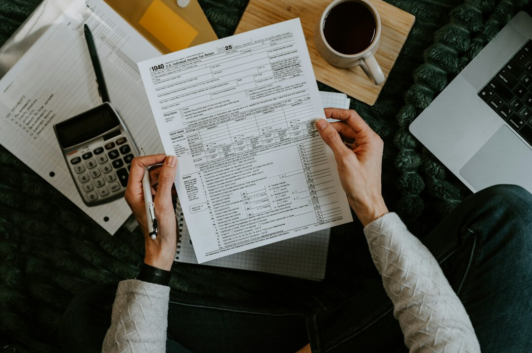 person reviewing monthly expenses